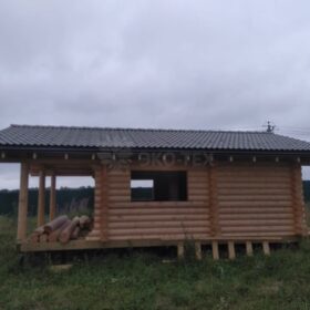 Фото дома и бани из оцилиндрованного бревна