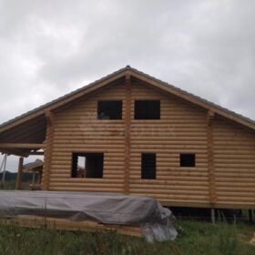 Фото дома и бани из оцилиндрованного бревна