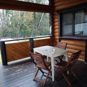 Фото дома и бани из оцилиндрованного бревна