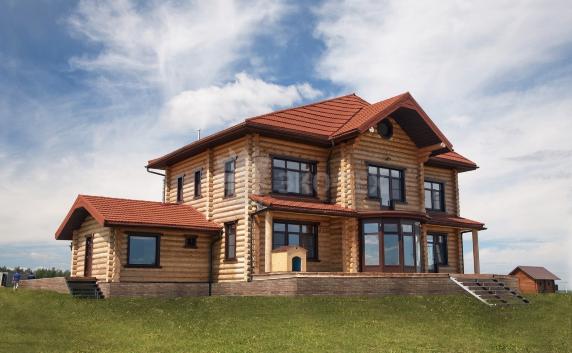 Фото дома и бани из оцилиндрованного бревна