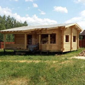 Фото дома и бани из оцилиндрованного бревна