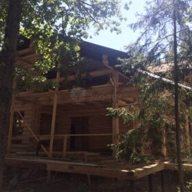 Фото дома и бани из оцилиндрованного бревна