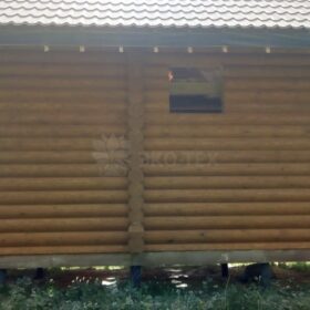 Фото дома и бани из оцилиндрованного бревна