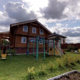 Фото дом из оцилиндрованного бревна по проекту фьорд