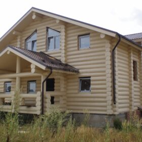 Фото домов из бревна ручной рубки