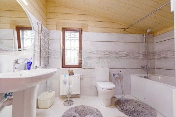 Дом по проекту Рим с гаражом из клееного бруса